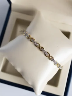 Bicolor schakelarmband met diamant 0,80crt + Luxe cadeau