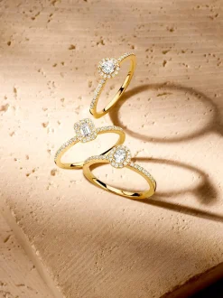 Geelgouden entourage ring met briljant 0,45crt. + Cadeau
