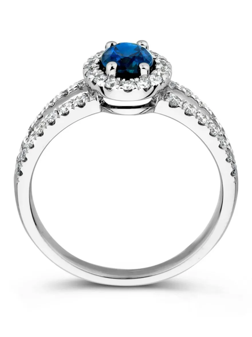 Witgouden entourage ring met diamant en ovale saffier